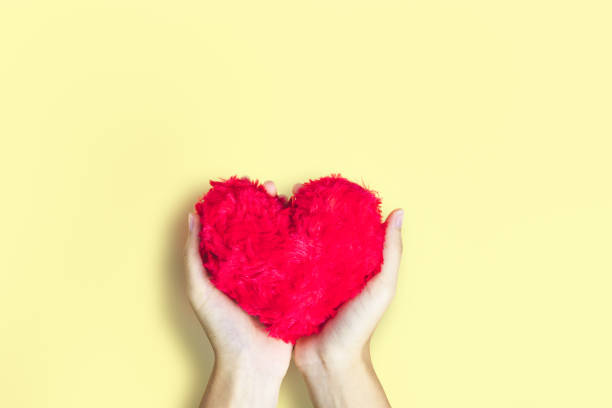 istock Women are giving red hearts. 1066182696