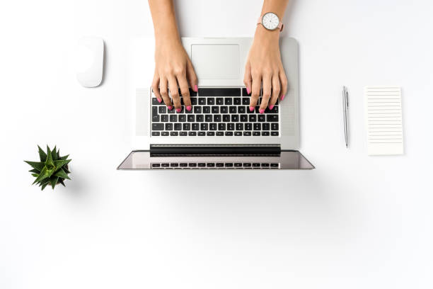 istock Woman working on laptop. Close up 1066186284