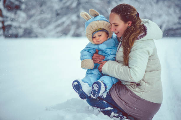 istock Mother and son in winter park 1066189312