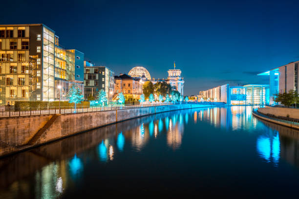 istock Berlin government district with Spree river at twilight, central Berlin Mitte, Germany 1066192100