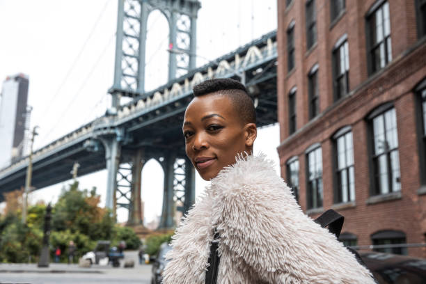 istock Beautiful young woman in NYC 1066192338