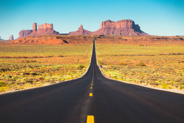 istock Classic highway view in Monument Valley at sunset, USA 1066192420