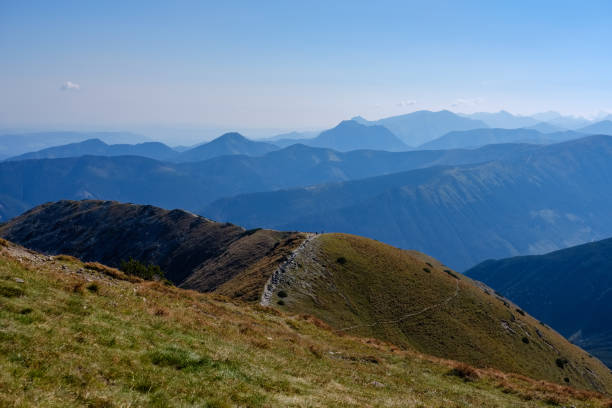 istock mountain top panorama in  autumn covered in mist or clouds 1066194706