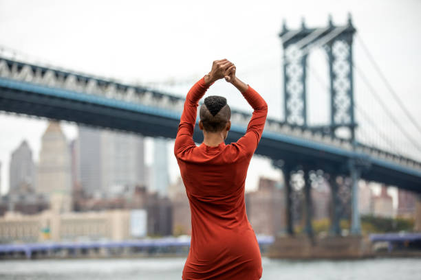 istock Beautiful young woman in NYC 1066194810