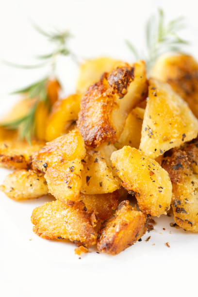 istock rustic golden english roasted duck fat potatoes 1066195100