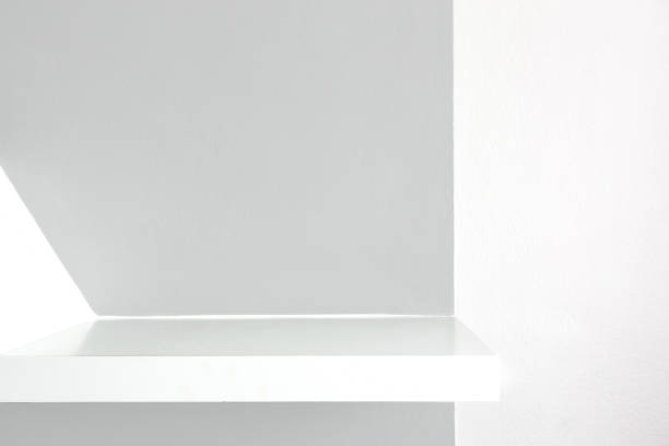 istock Empty white shelf, retail shelves from plywood frame. 1066198158