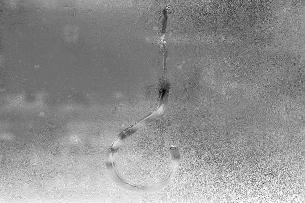 istock Wet misted glass with water drops and dew with a blurred background 1066210542