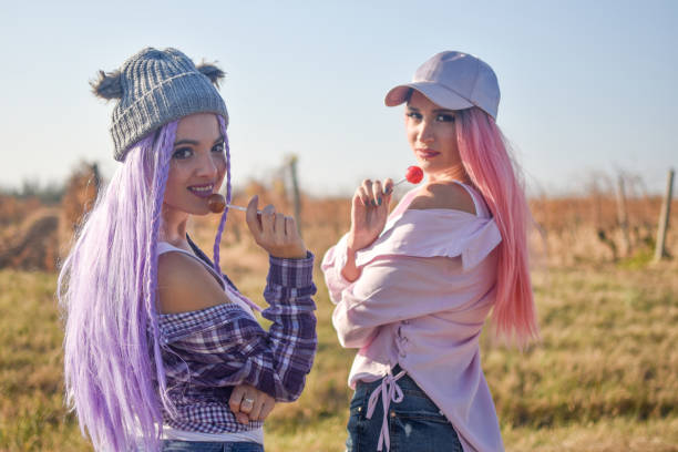 two beautiful girl with wig stock photo