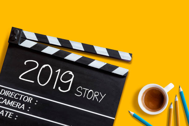 istock 2019 story ,text title on movie Clapper board and coffee cup 1066227286