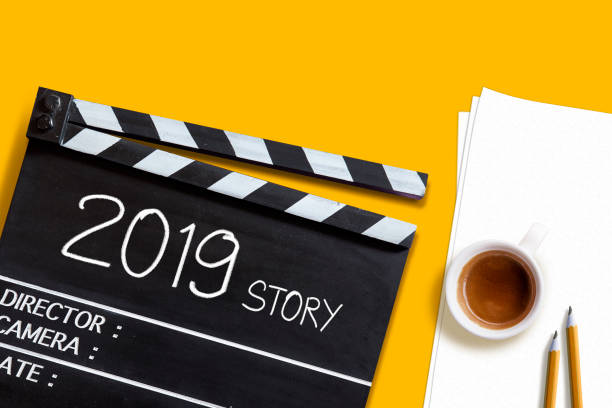 istock 2019 story ,text title on movie Clapper board on work place 1066227308