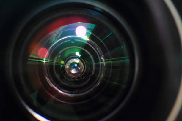 istock photo camera lens background 1066227850