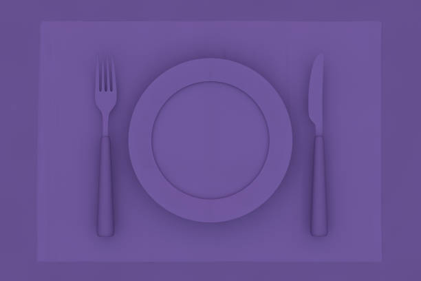 istock Purple Plate, Fork, Knife, Spoon on Purple Background, Flat Lay, Minimal Concept 1066233464