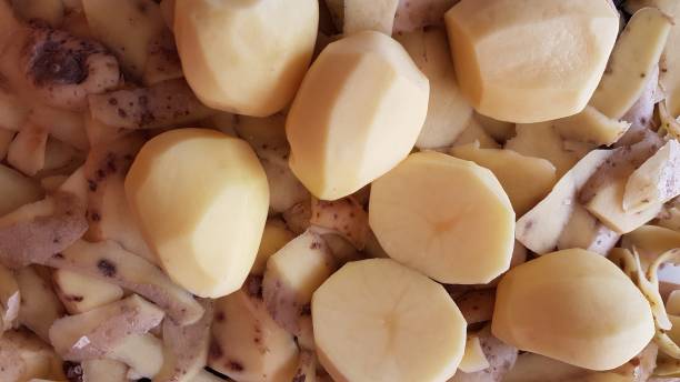 istock potato peals fresh vegetable with knife and peeler kitchen tool 1066234280