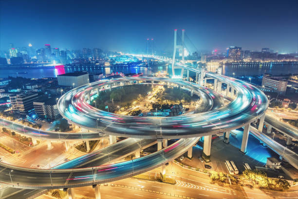 istock Scenic view on famous highway interchange in Shanghai, China at night. 1066236568