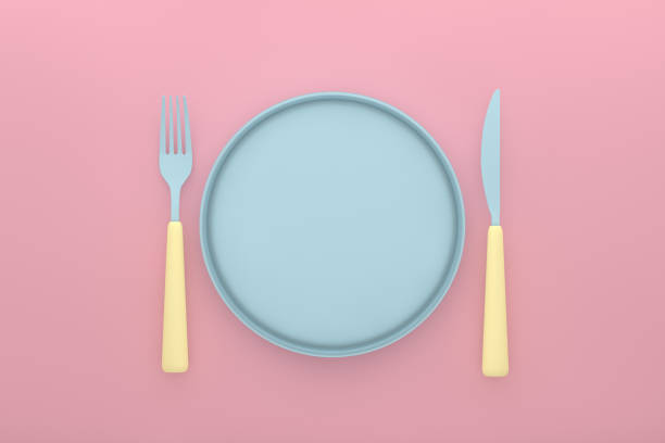 istock Blue Plate, Fork, Knife on Pink Background, Flat Lay, Minimal Concept 1066236602
