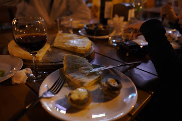 istock bread mushrooms with cheese on a plate and wine in a glass for dinner 1066238508
