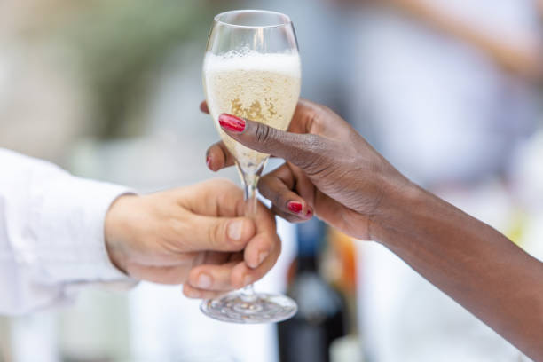 istock Waiter giving white wine 1066239060