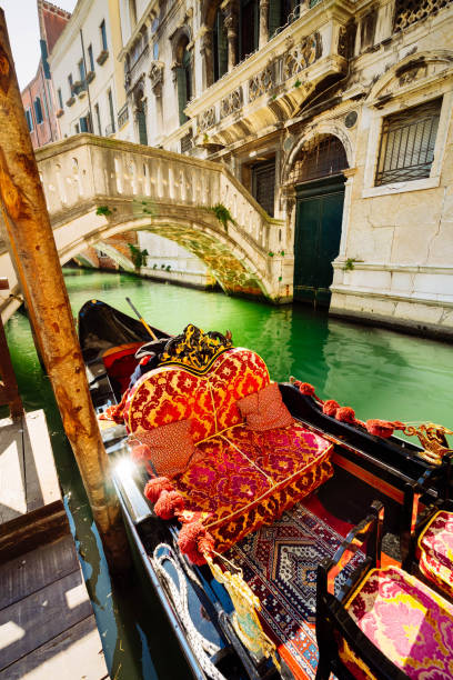 istock Venetian gondola in canal 1066241948