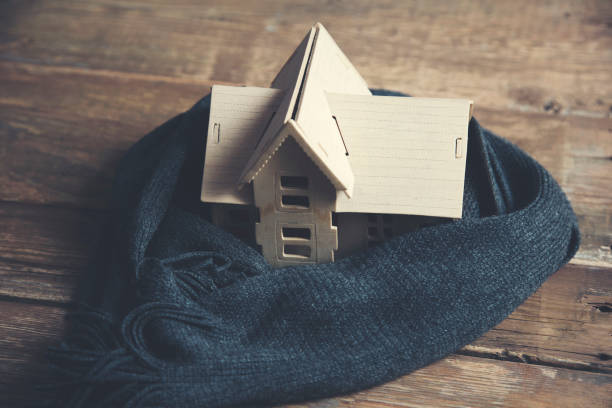 istock house with scarf on wooden table 1066245792