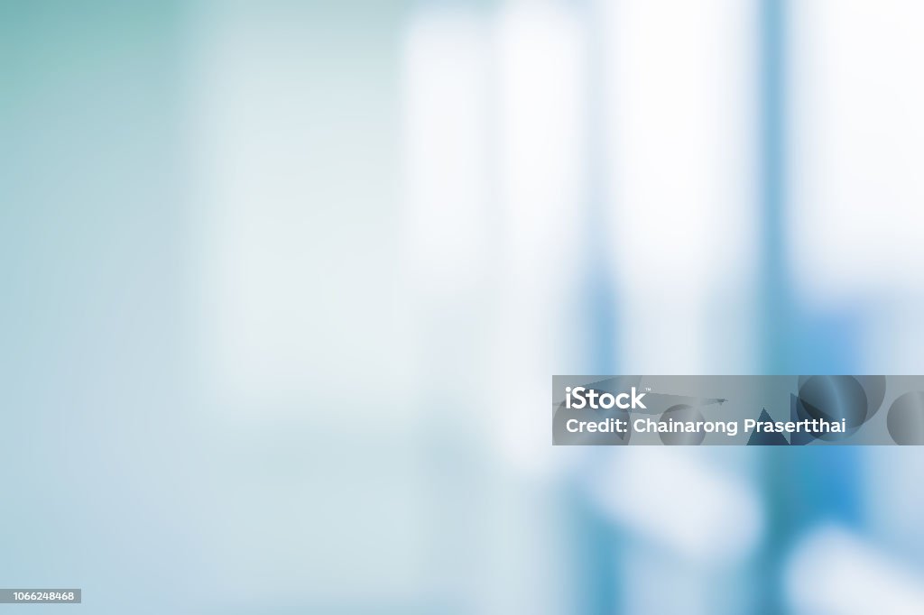 abstract blurred interior of corridor clinic background in blue color , blurry image for presentation ,banner ,ads design concept Backgrounds Stock Photo