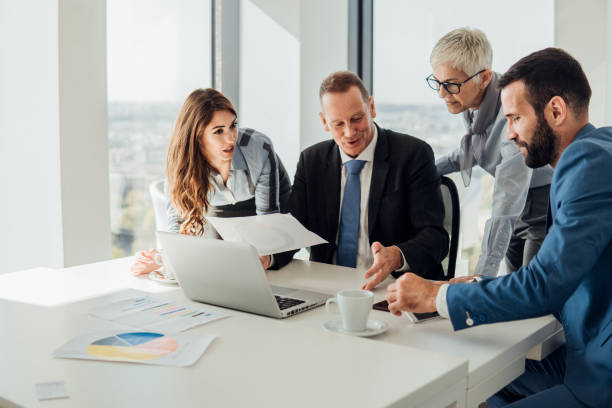 istock Businessman working with coworkers 1066249198