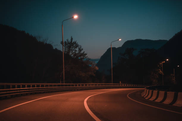 istock night road in the mountains 1066253938