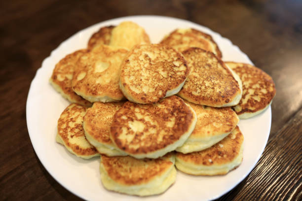 istock Cottage cheese pancakes on white plate 1066254408