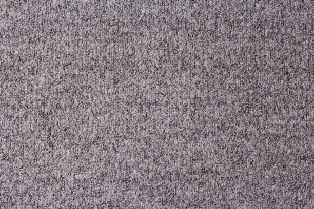 istock Background of grey knitted fabric. Home made stitchwork. 1066260020