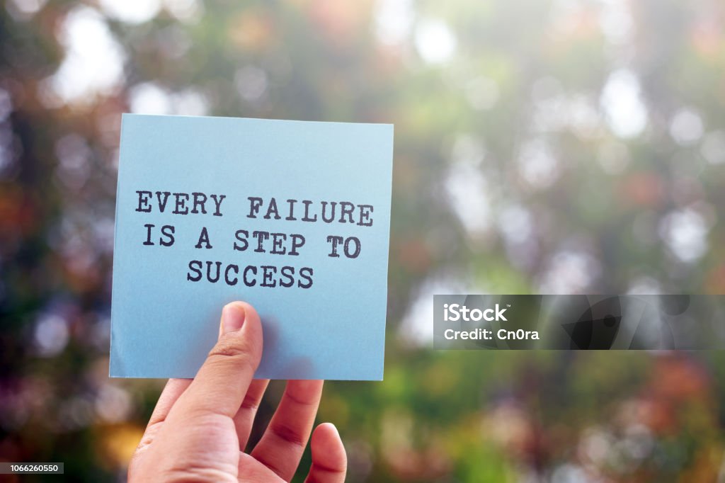 Inspirational quote- Every failure is a step to success Inspirational quotes, Hand, Human Hand, Quotation - Text, Text Failure Stock Photo