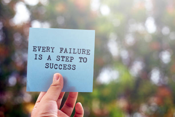 inspirational quote- every failure is a step to success - missing in action imagens e fotografias de stock