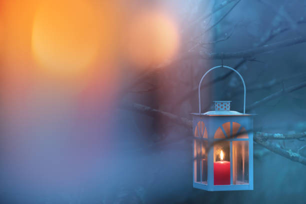 istock Lantern hanging from tree branch. Selective focus and shallow depth of field. 1066262396
