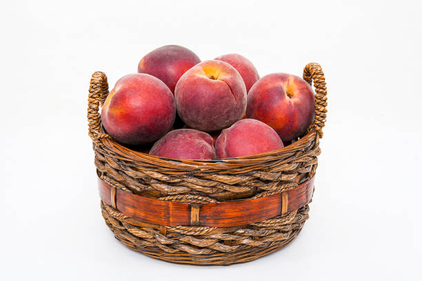 Peach isolated on white background.