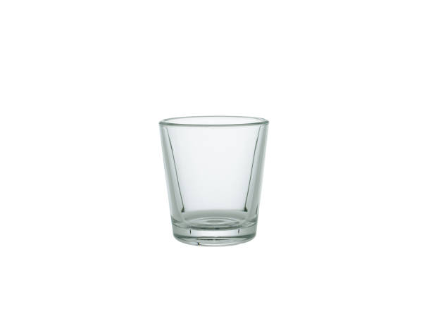 istock empty shot glass isolated on white background 1066266722