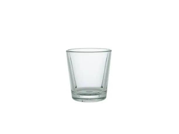 Photo of empty shot glass isolated on white background