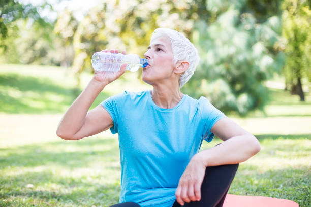 istock Happy senior lady relaxing after training 1066267252
