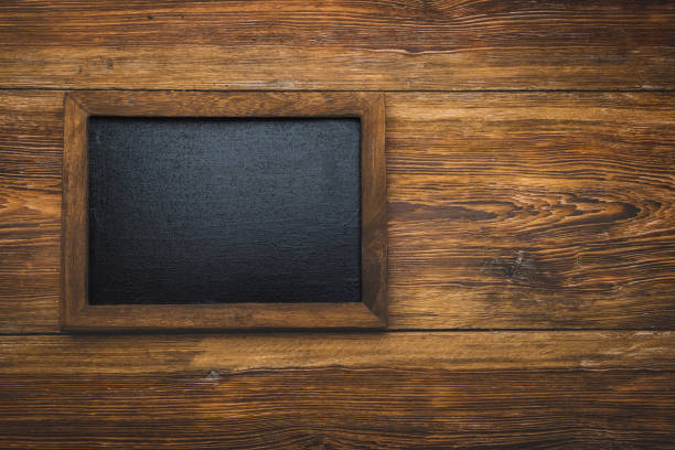Blackbord on wooden background