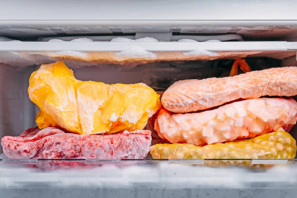 istock Different kind of deep frozen vegetables in plastic bags in a refrigerator 1066271240