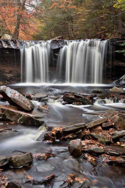 istock fall waterfalls at rickett's glen 1066272730