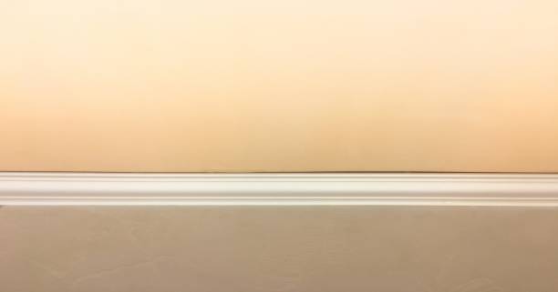 istock room interior, color-painted floor and wall separated by ornament. 1066282742
