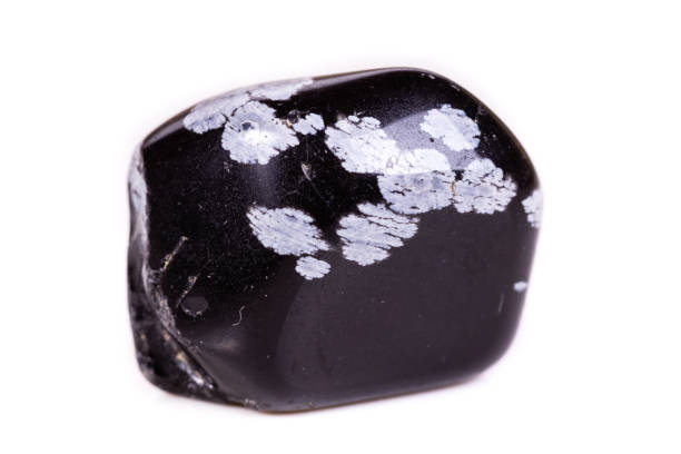 istock Macro mineral stone snow obsidian on white background 1066282804