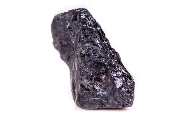istock Macro mineral stone sorrel - black tourmaline on white background 1066282838