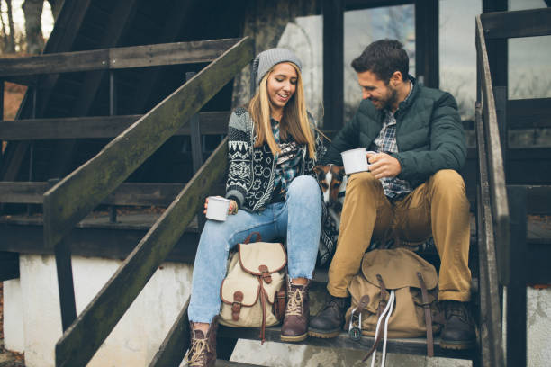 istock Cute Couple On Camping With Their Dog 1066284820