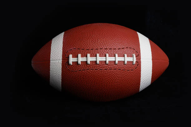 istock brown American Football 1066286654