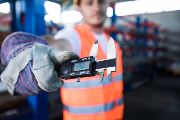 istock Close up of manual worker working with caliper. 1066286658