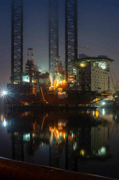 istock Oil platform, foggy night. 1066288744