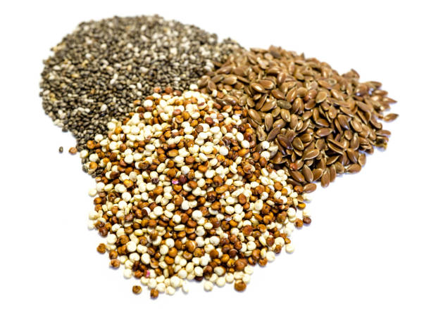 istock Quinoa chia and flax seeds isolated on white background 1066289134