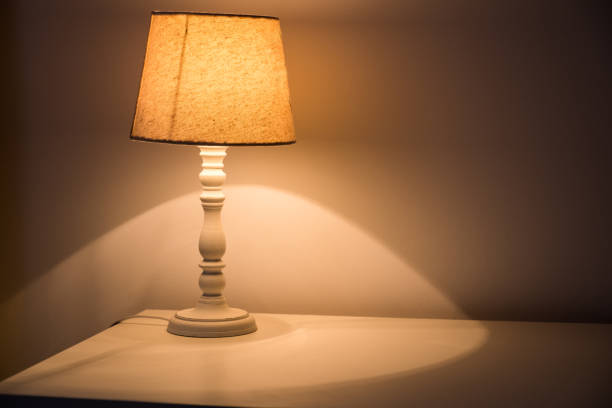 istock Table lamp at the bedroom. House cosy interior 1066297562