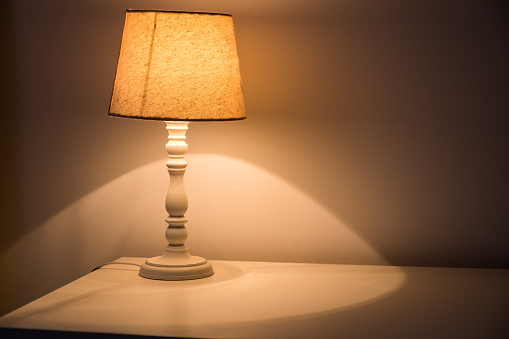 Table lamp at the bedroom. House cosy interior