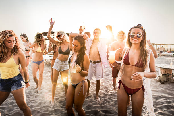 istock Beach party in summer at sunset! 1066304528