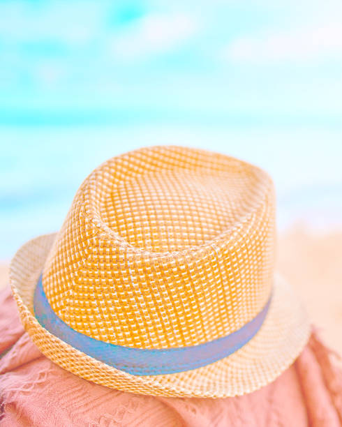 istock Straw hat on a hot day off. 1066307402